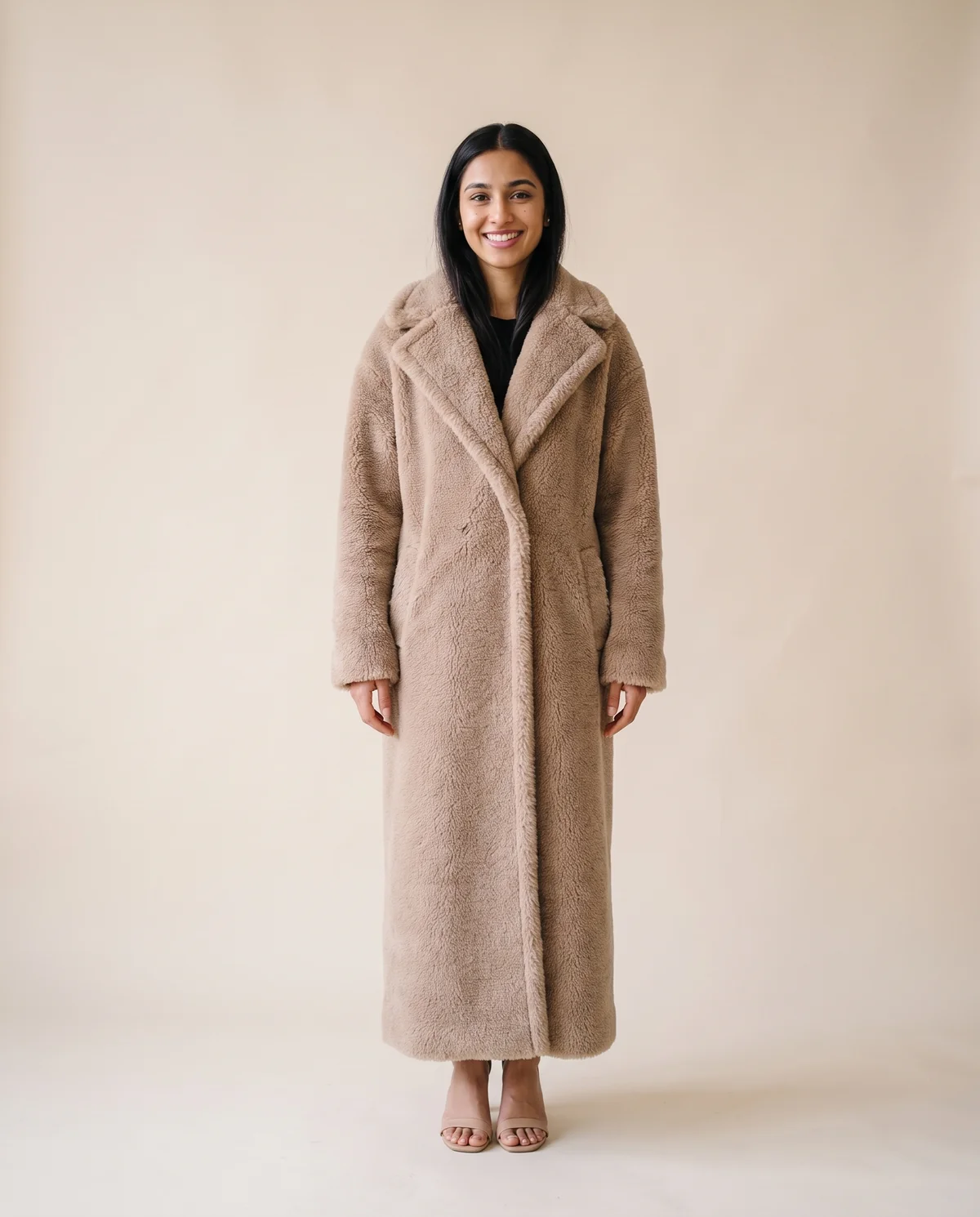 Maxi Teddy Coat in Sand, front view, worn by Priya