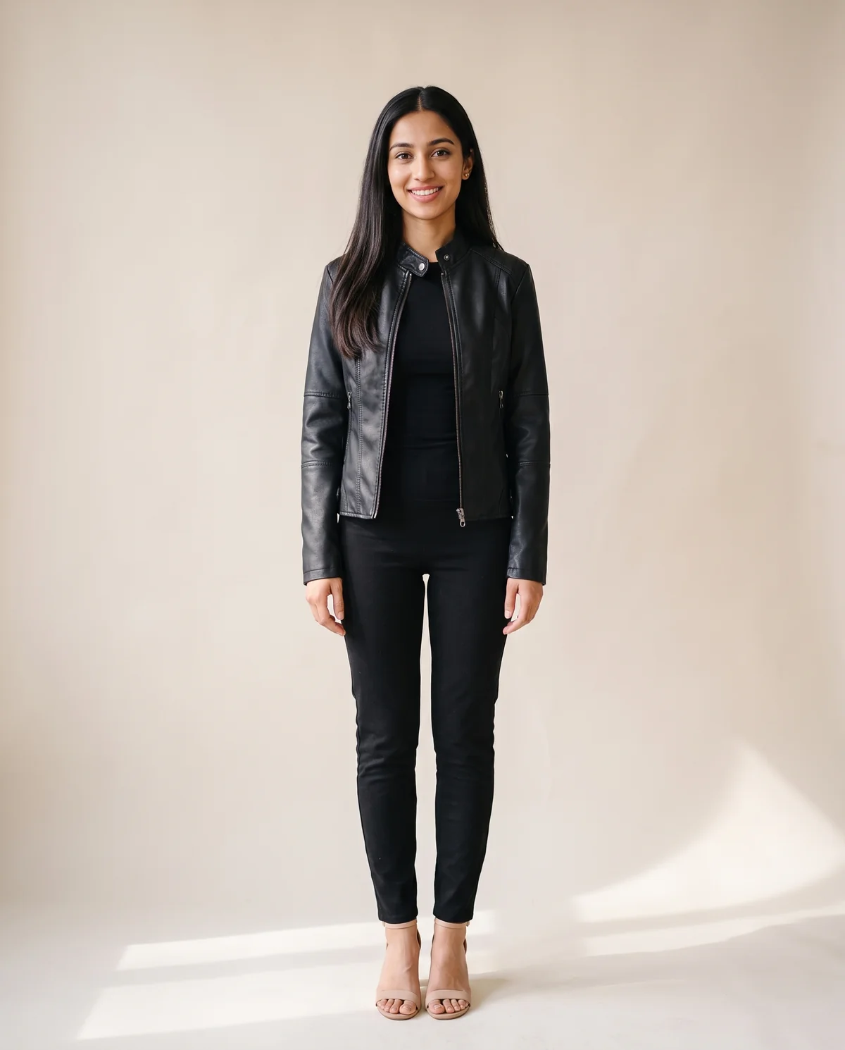 Faux Leather Slim Stand-Collar Biker Jacket in Black, front view, worn by Priya