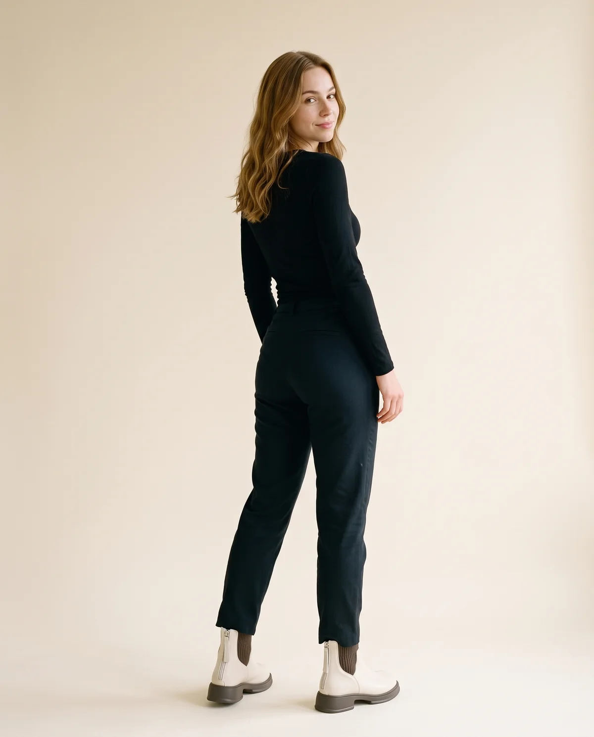 Knit-Panel Chelsea Ankle Boot in Cream, back view, worn by Ava