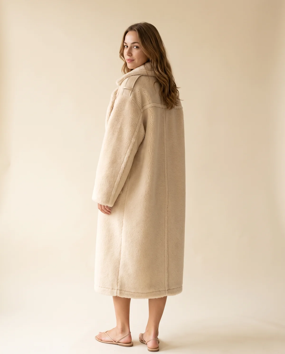 Double-Breasted Teddy Coat in Cream, back view, worn by Ava