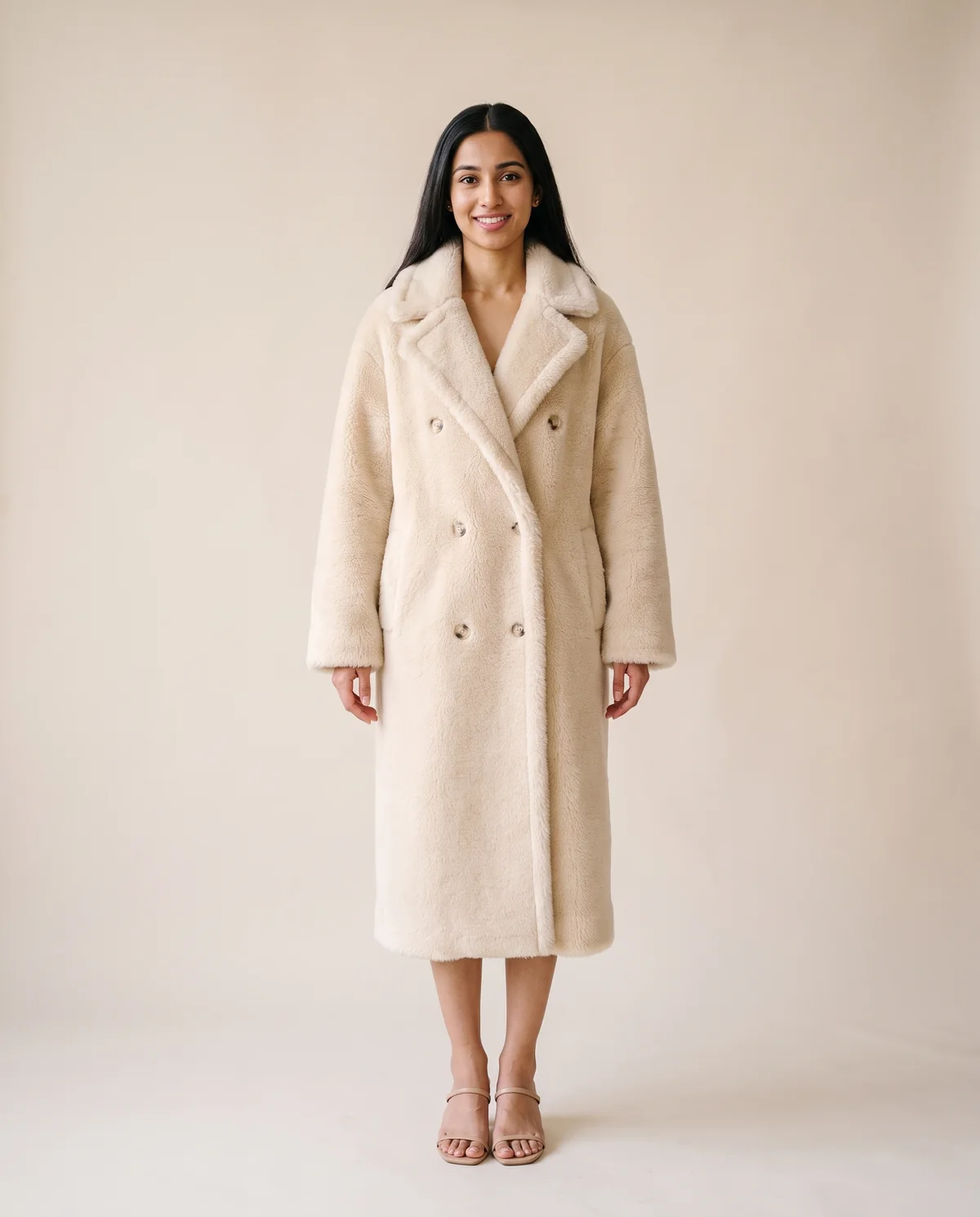 Double-Breasted Teddy Coat in Cream, front view, worn by Priya
