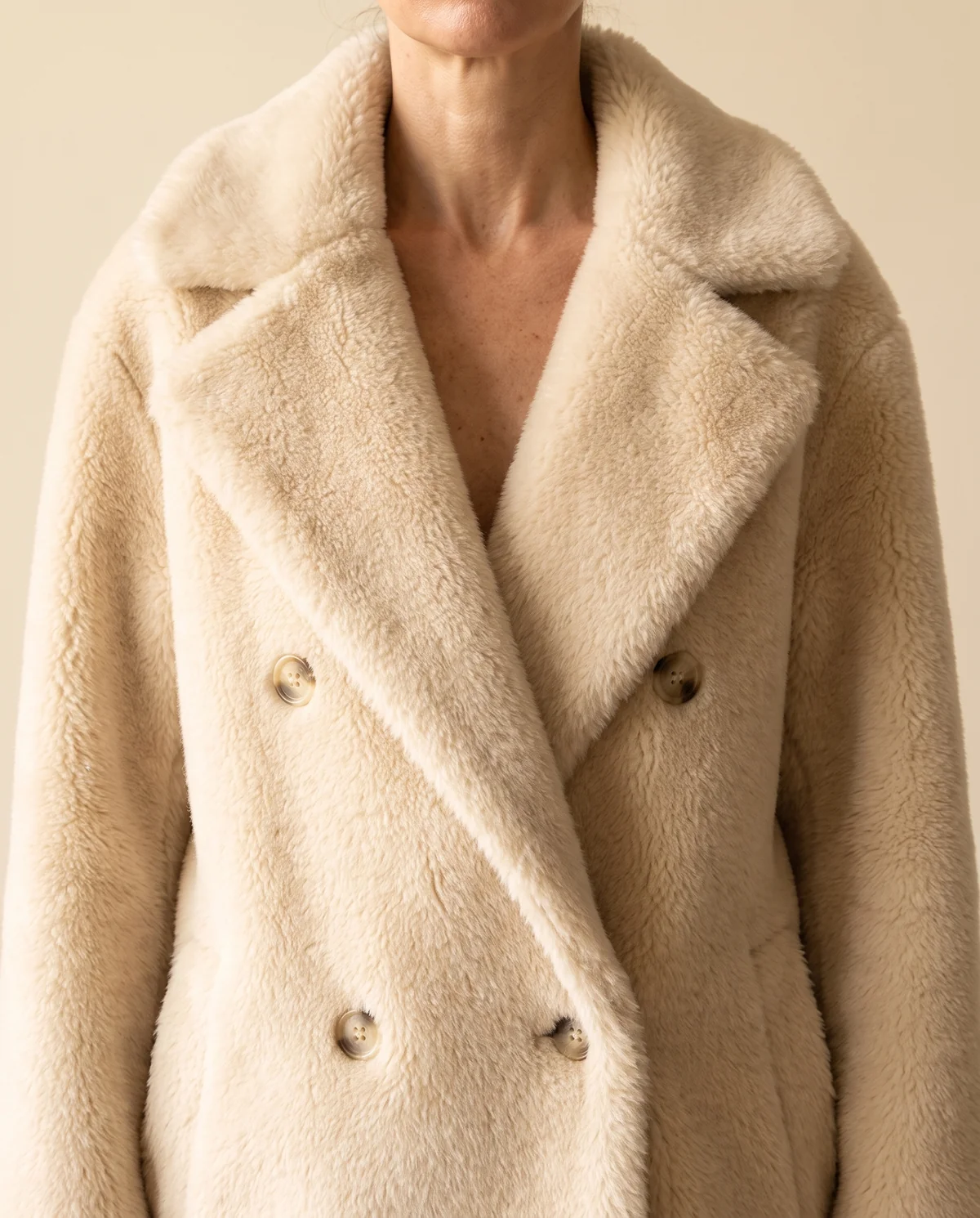 Double-Breasted Teddy Coat in Cream, close-up of the detail