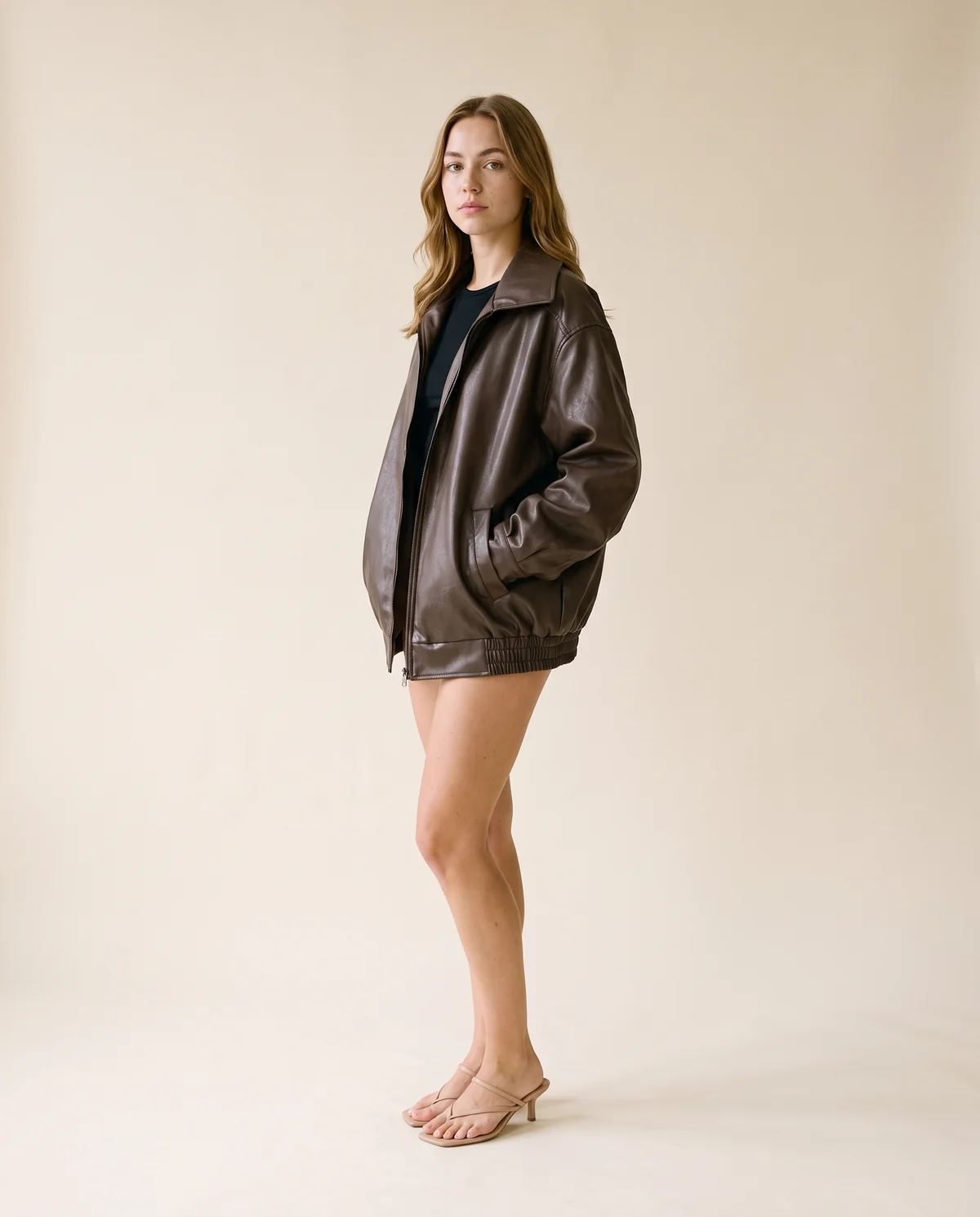 Faux Leather Collared Bomber Jacket in Chocolate, side view, worn by Ava