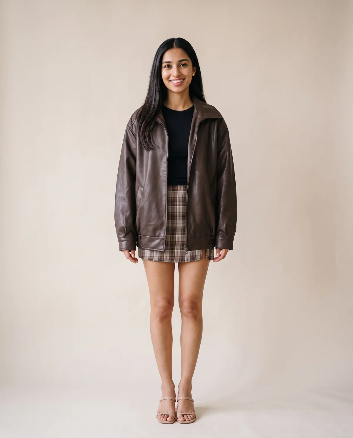 Faux Leather Collared Bomber Jacket in Chocolate, front view, worn by Priya