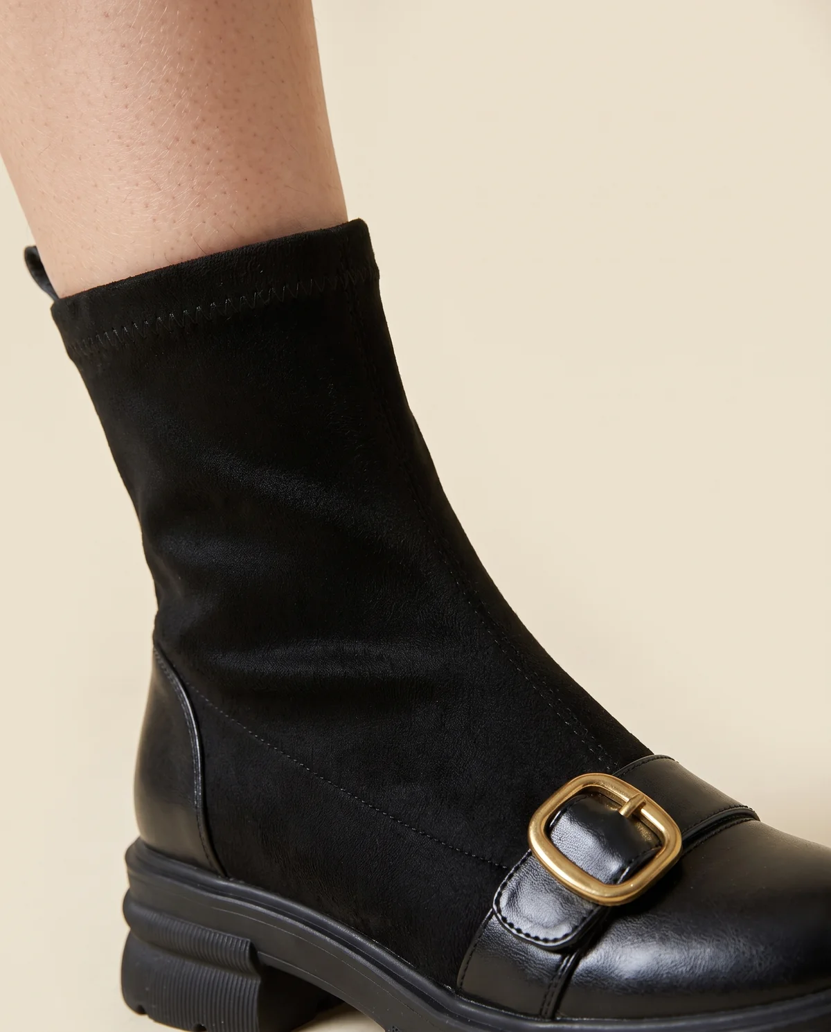 Sock Ankle Boot with Buckle Toe-Cap in Black, close-up of the detail