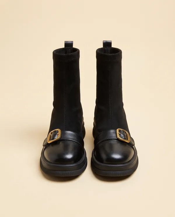 Sock Ankle Boot with Buckle Toe-Cap in Black, product shot on a plain background