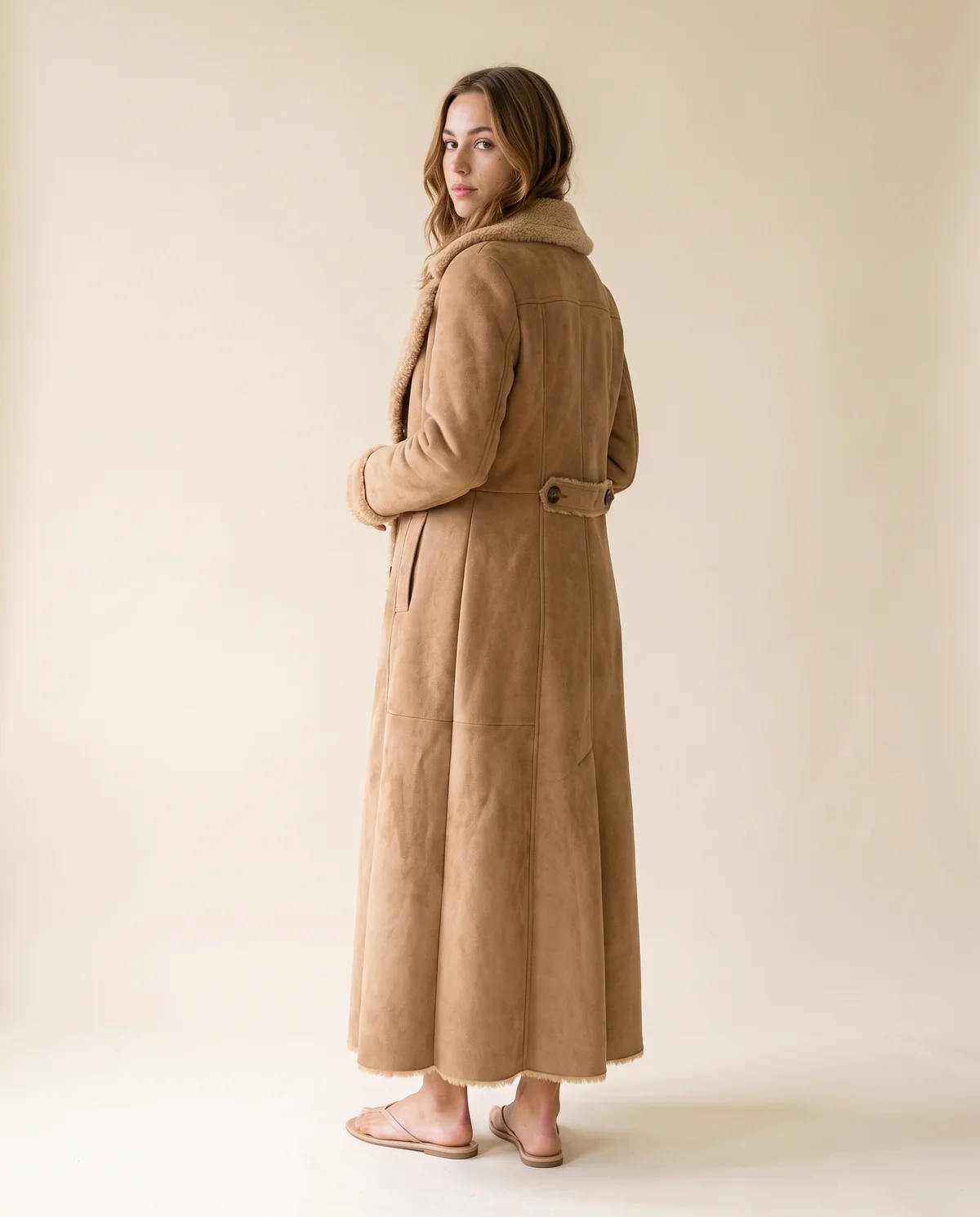 Faux Suede Shearling-Trim Long Coat in Tan, back view, worn by Ava