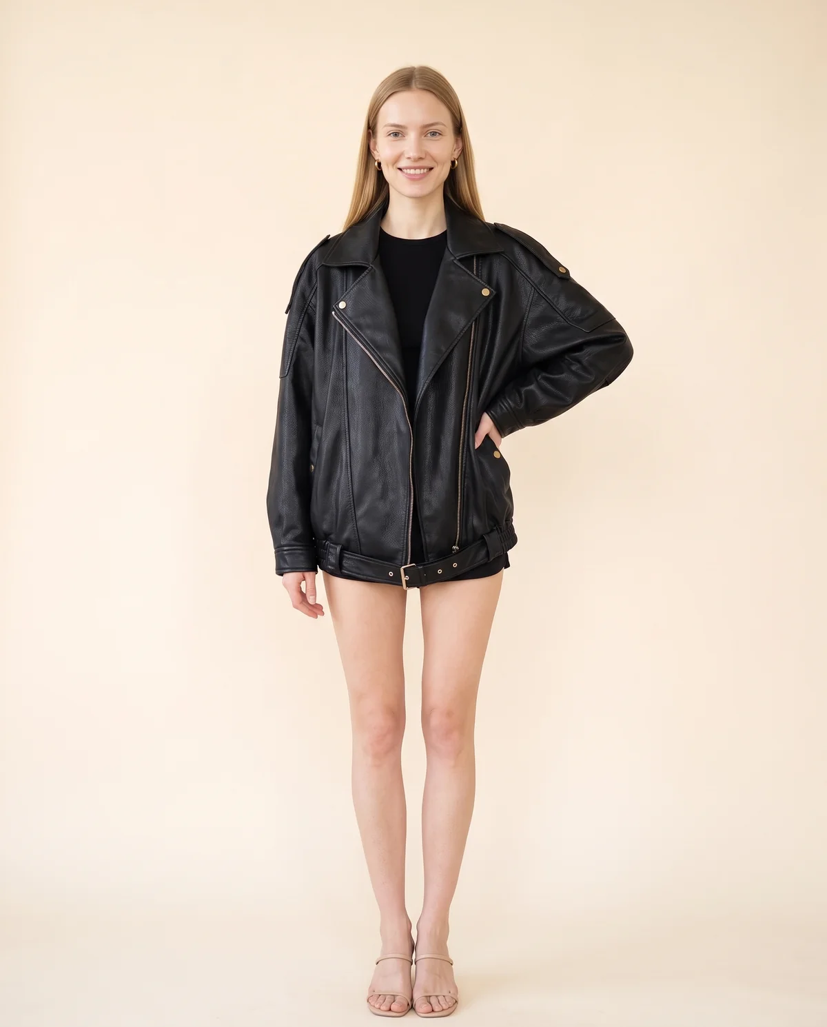 Faux Leather Oversized Belted-Hem Moto Jacket in Black, front view, worn by Maya