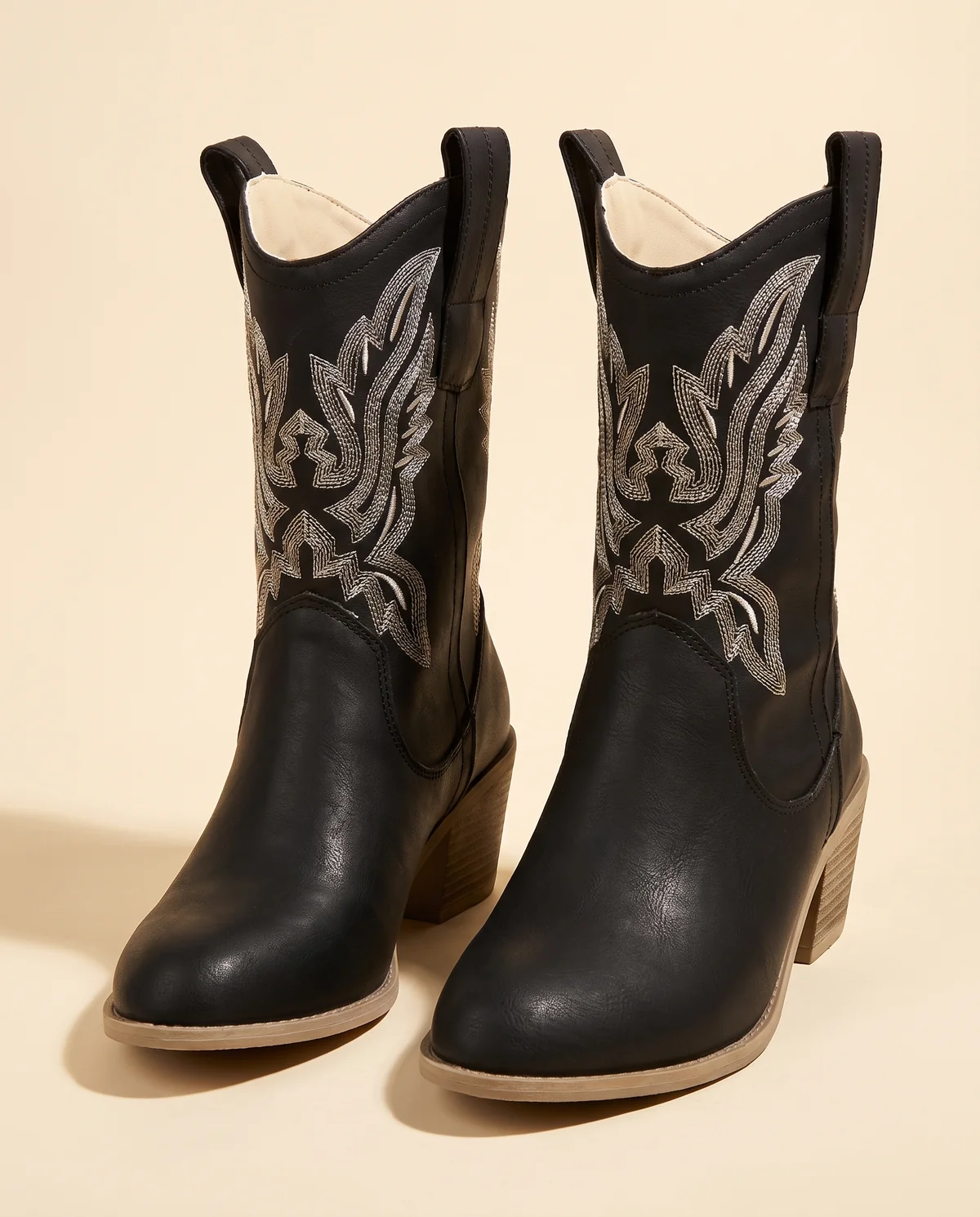 Black Embroidered Western Ankle Boot in Black, product shot on a plain background