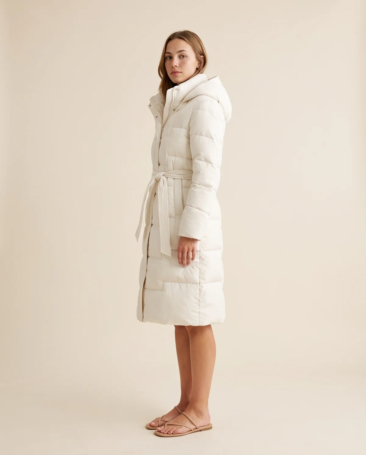 Belted Quilted Puffer Coat in Ivory, side view, worn by Ava