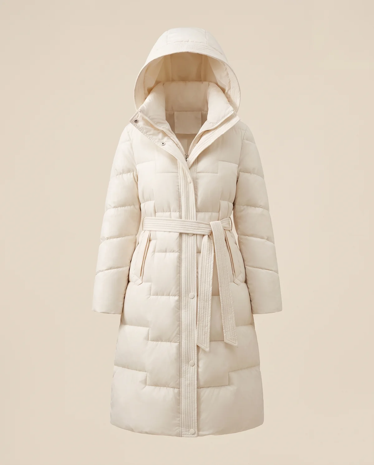 Belted Quilted Puffer Coat in Ivory, product shot on a plain background