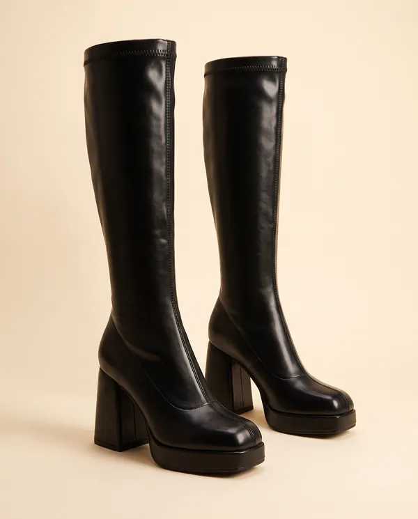 Platform Stretch Knee-High Boot in Black, product shot on a plain background