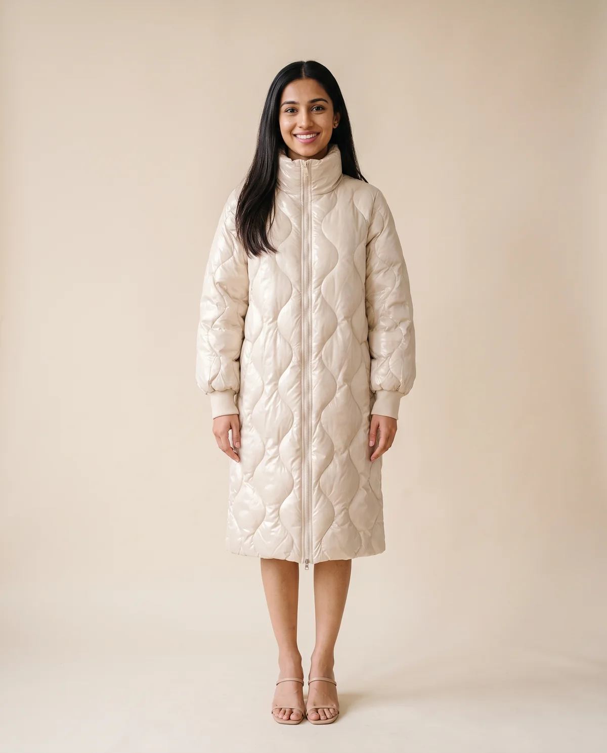 Glossy Quilted Puffer Coat in Cream, front view, worn by Priya