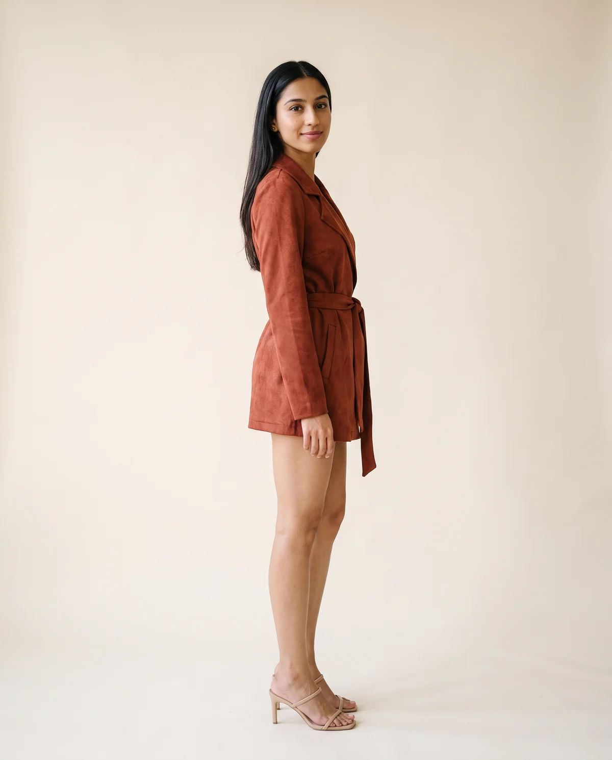 Faux Suede Tie-Waist Wrap Jacket in Rust, side view, worn by Priya