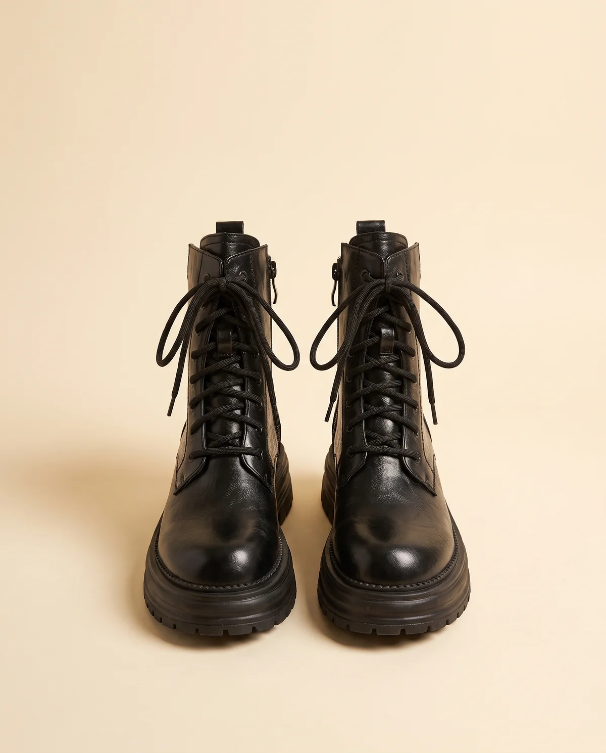Chunky Lace-Up Combat Ankle Boot in Black, product shot on a plain background