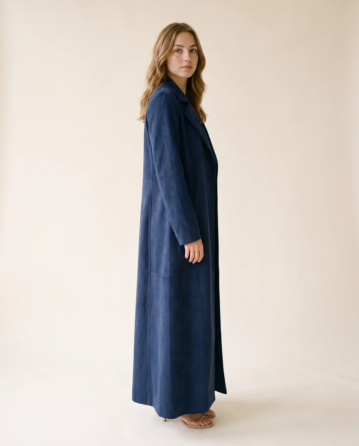 Long Faux Suede Coat in Navy, side view, worn by Ava