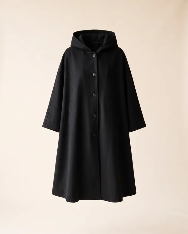 Hooded Cape Coat in Black, product shot on a plain background