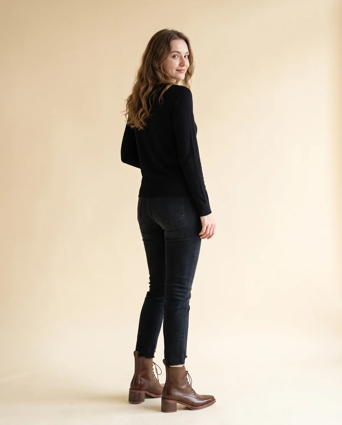 Lace-Up Block-Heel Ankle Boot in Cognac, back view, worn by Ava
