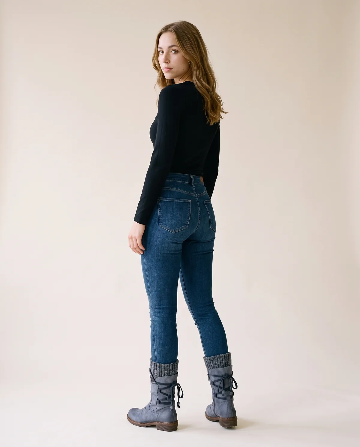 Back-Lace Knit-Cuff Mid-Calf Boot in Slate Blue, back view, worn by Ava