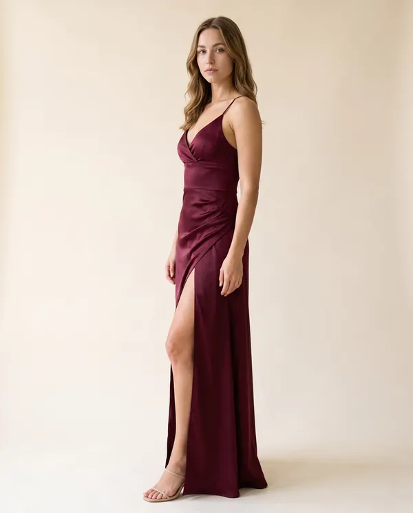 Stretch Satin Wrap Maxi Dress in Wine, side view, worn by Ava
