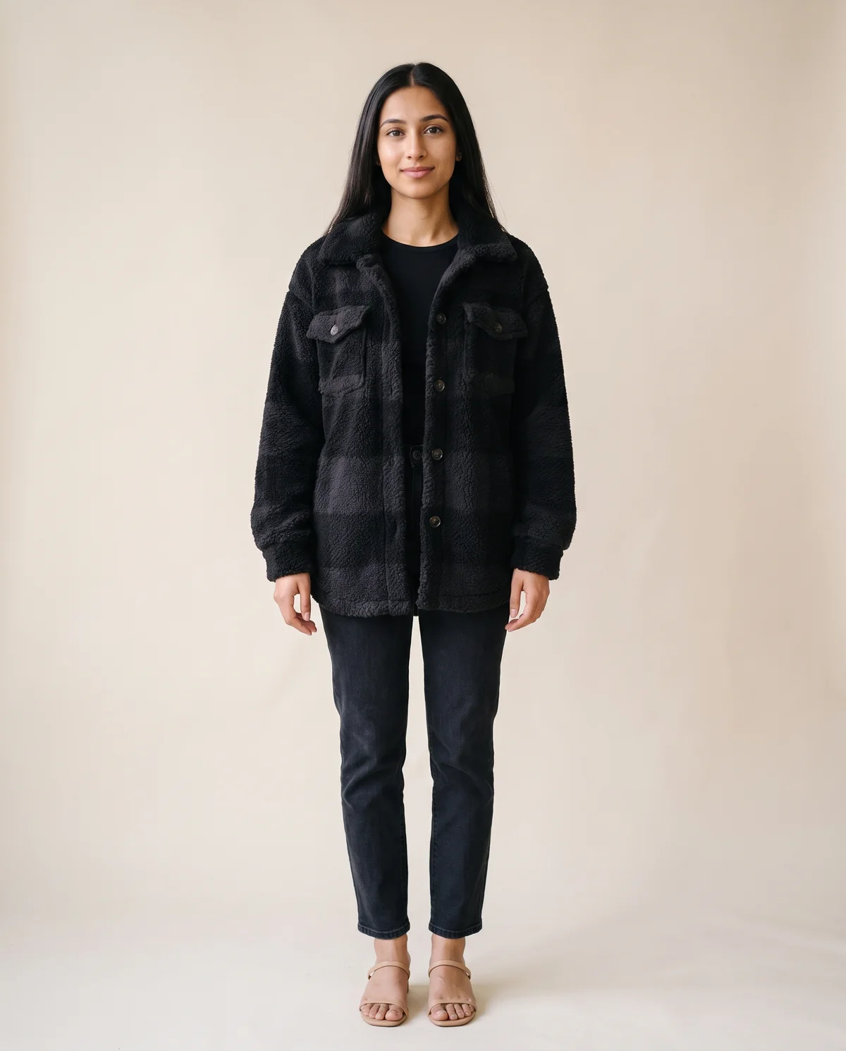 Faux Teddy Check Shacket in Black, front view, worn by Priya