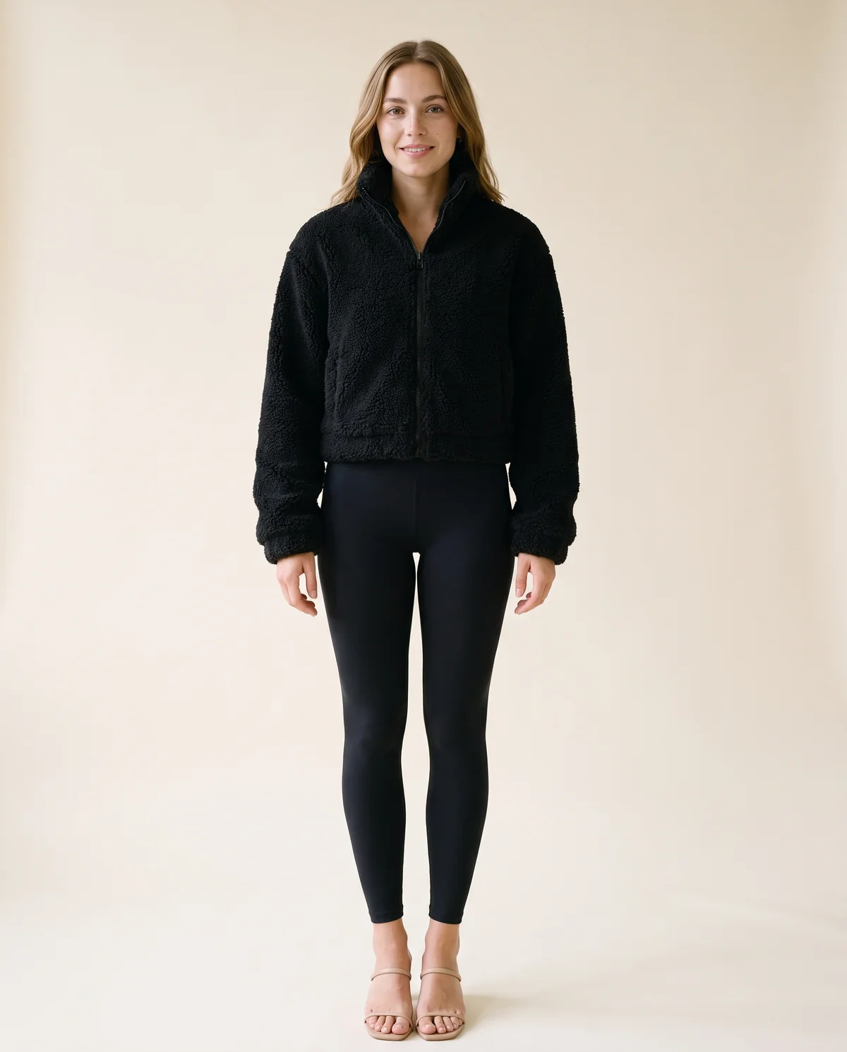 Faux Teddy Zip Cropped Jacket in Black, front view, worn by Ava