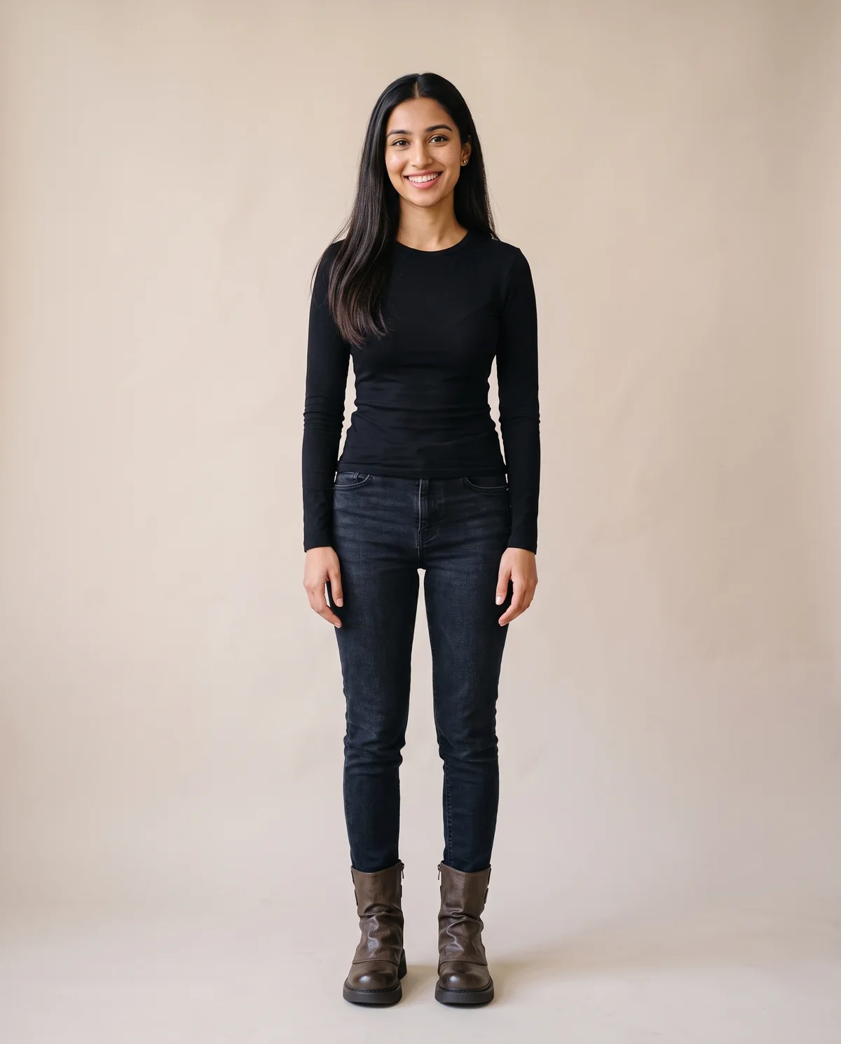 Slouch Ankle Boot with Back Buckles in Chocolate, front view, worn by Priya