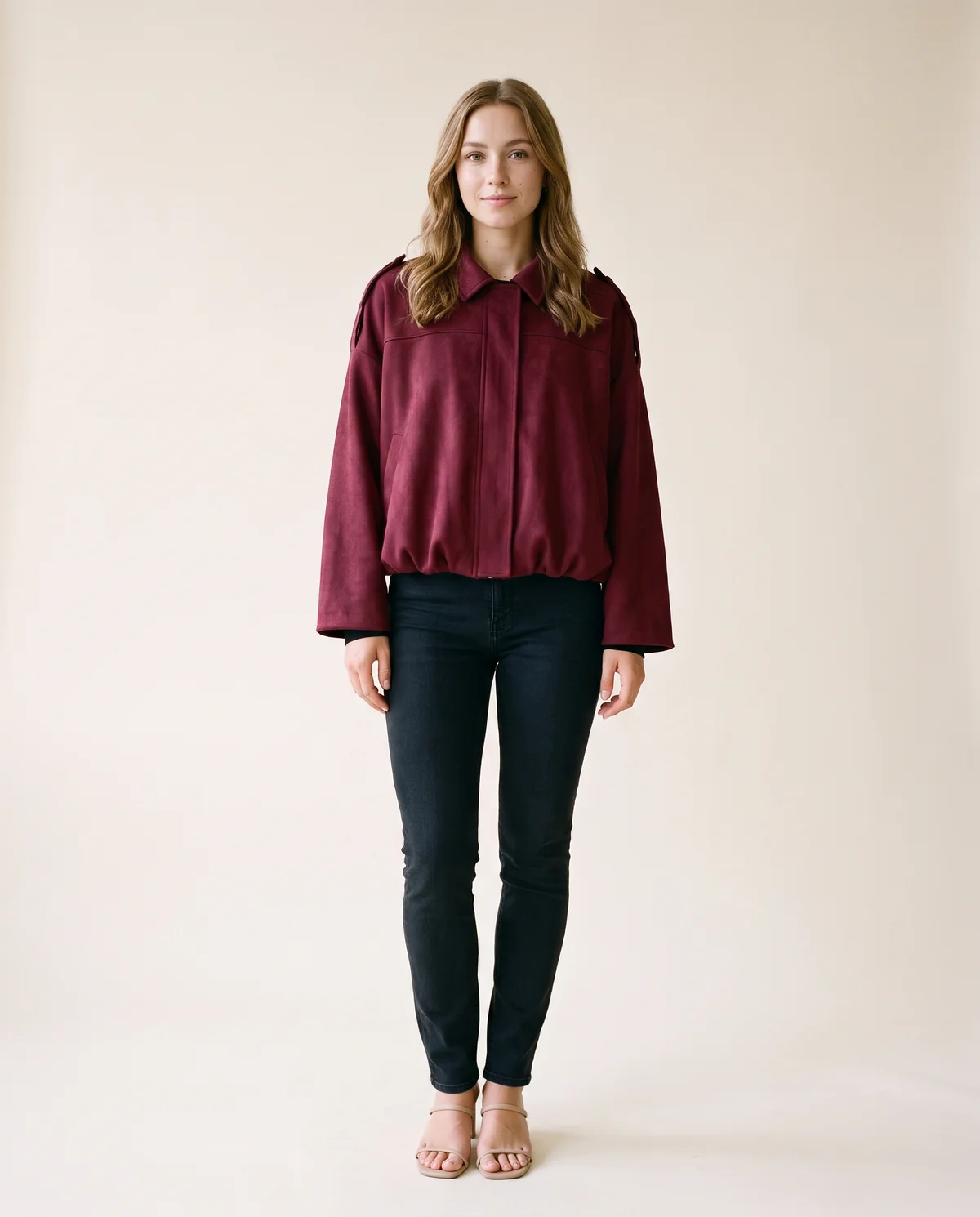 Faux Suede Bubble-Hem Bomber Jacket in Burgundy, front view, worn by Ava