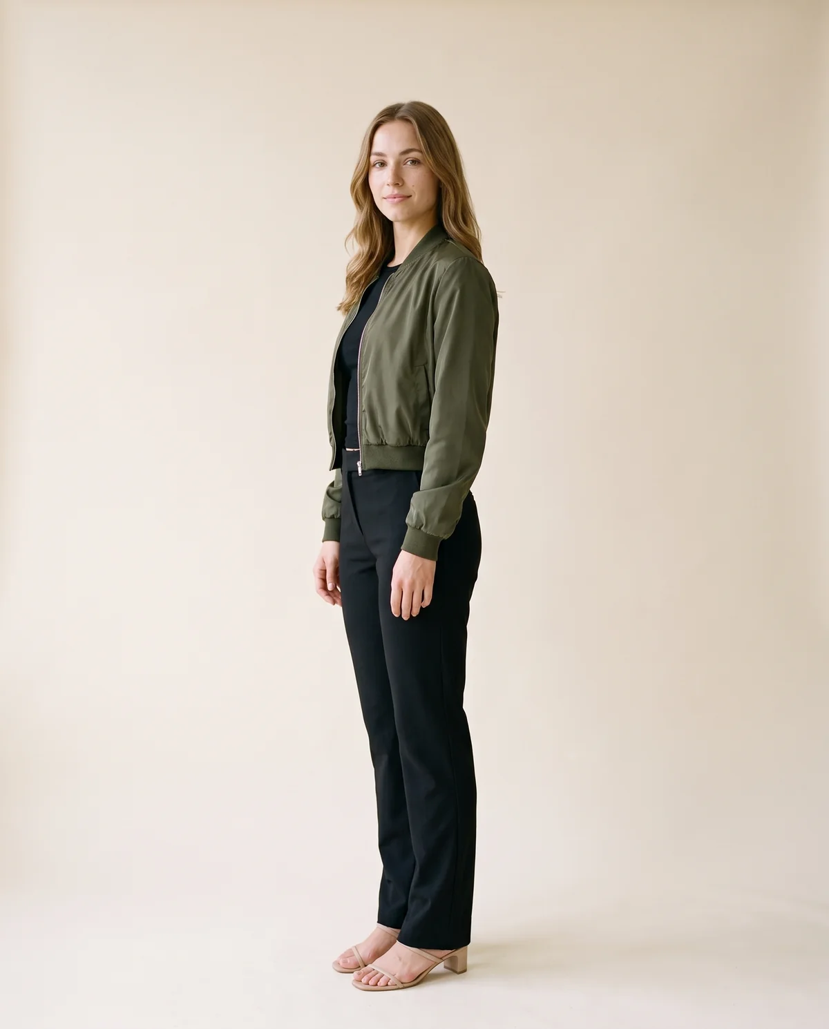 Satin-Finish Cropped Bomber Jacket in Olive, side view, worn by Ava
