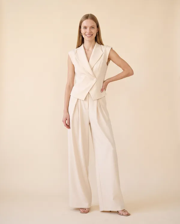 Sleeveless Waistcoat and Wide-Leg Trouser Set in Cream, front view, worn by Maya
