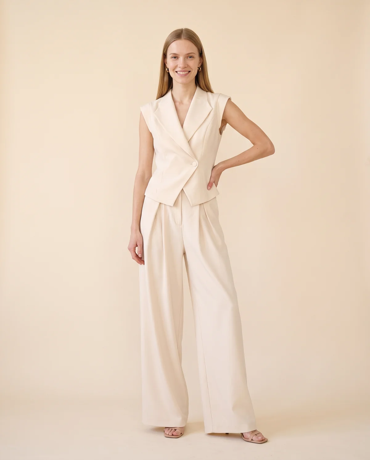 Sleeveless Waistcoat and Wide-Leg Trouser Set in Cream, front view, worn by Maya
