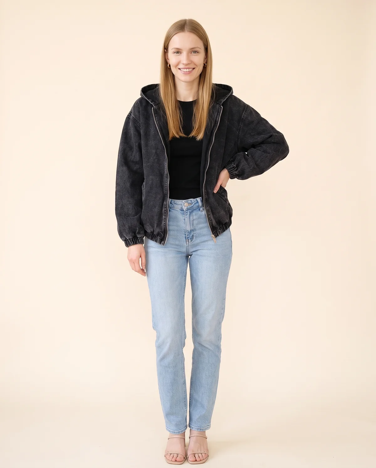 Washed Denim Hooded Zip Bomber in Washed Black, front view, worn by Maya