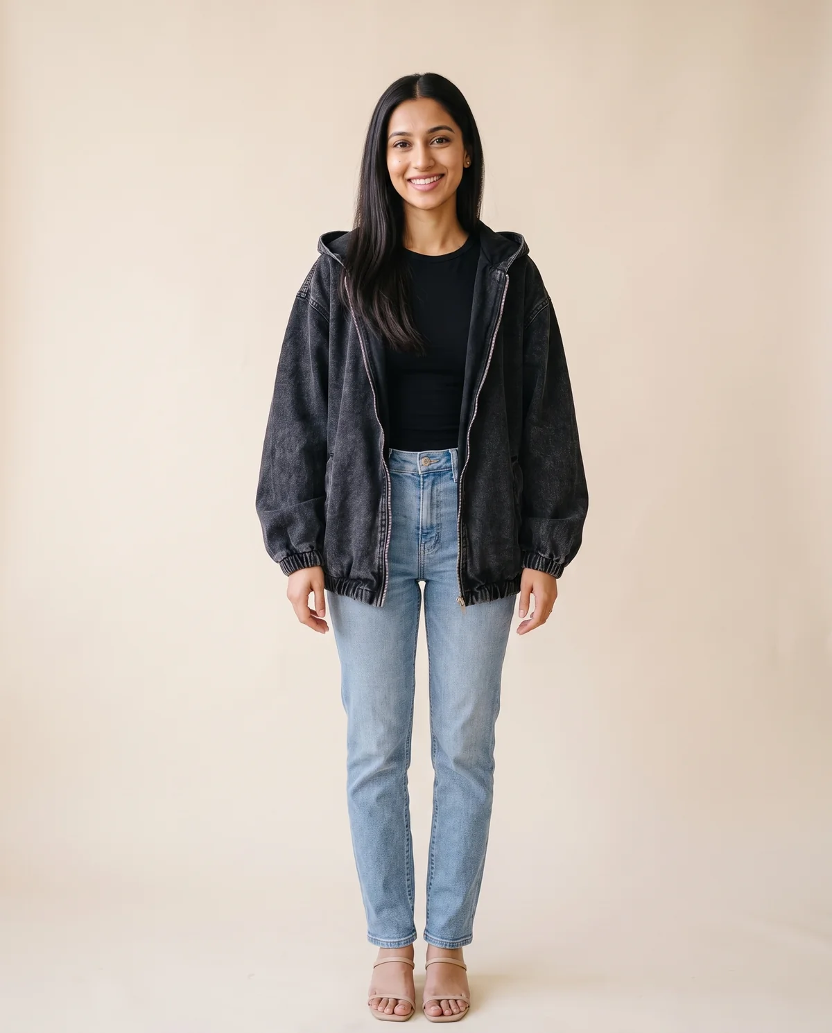 Washed Denim Hooded Zip Bomber in Washed Black, front view, worn by Priya