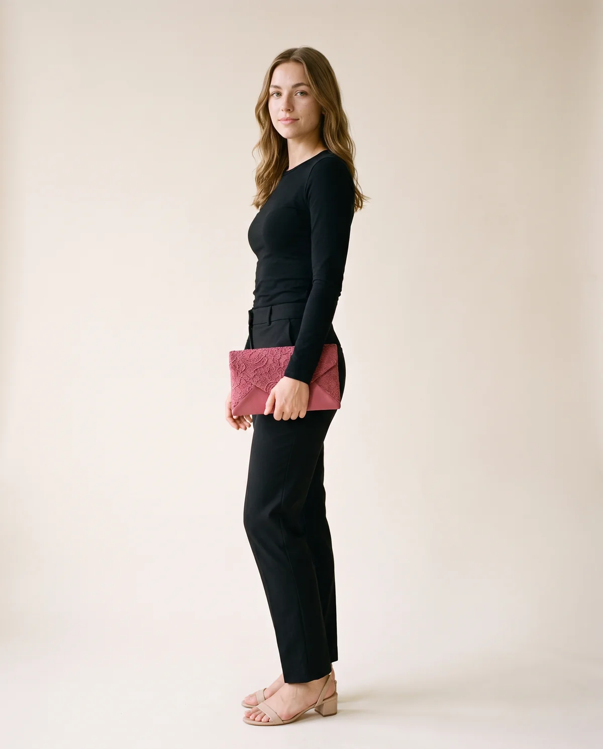 Lace Satin Envelope Clutch in Dusky Pink, side view, worn by Ava