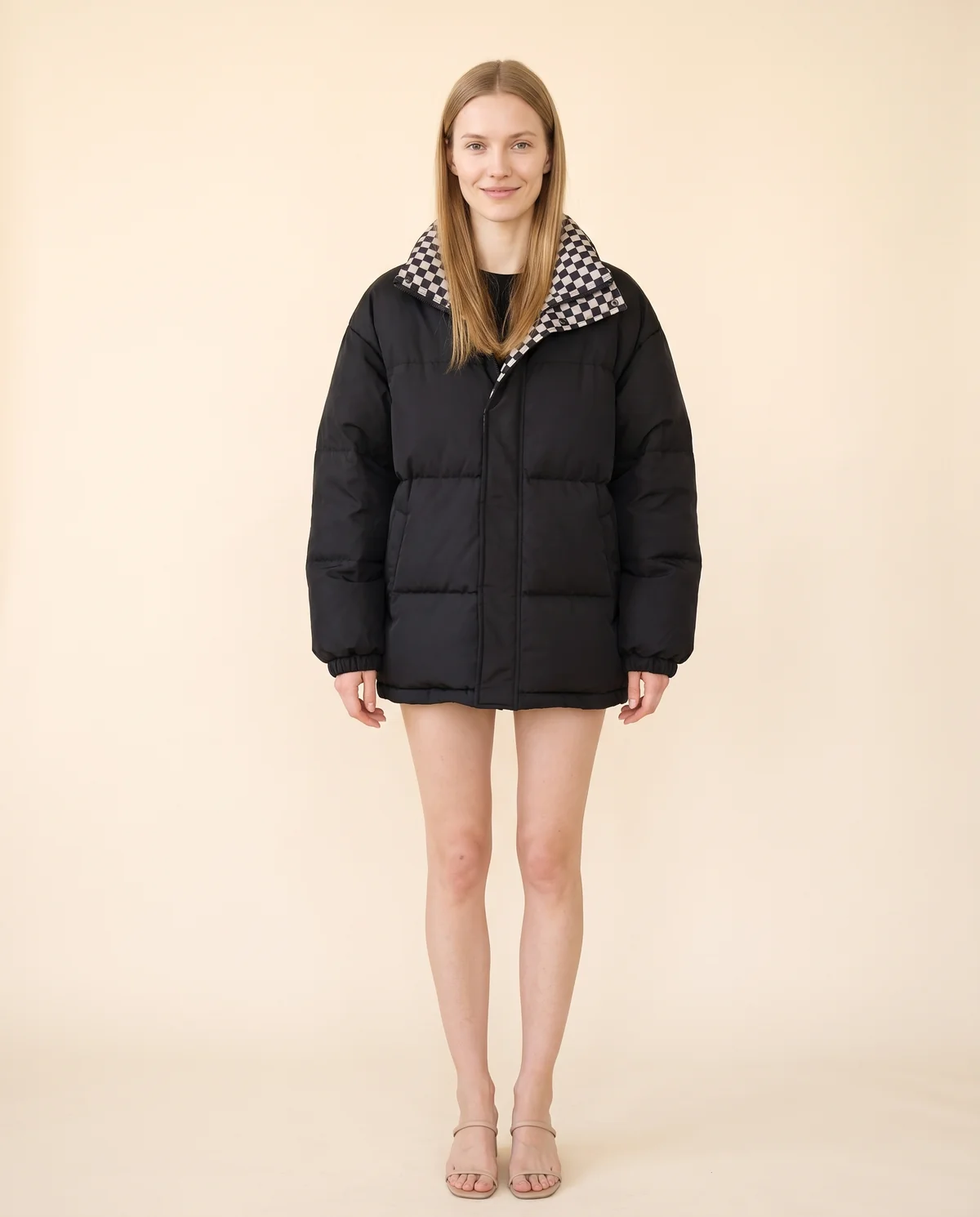 Oversized Puffer Jacket with Check Collar in Black, front view, worn by Maya