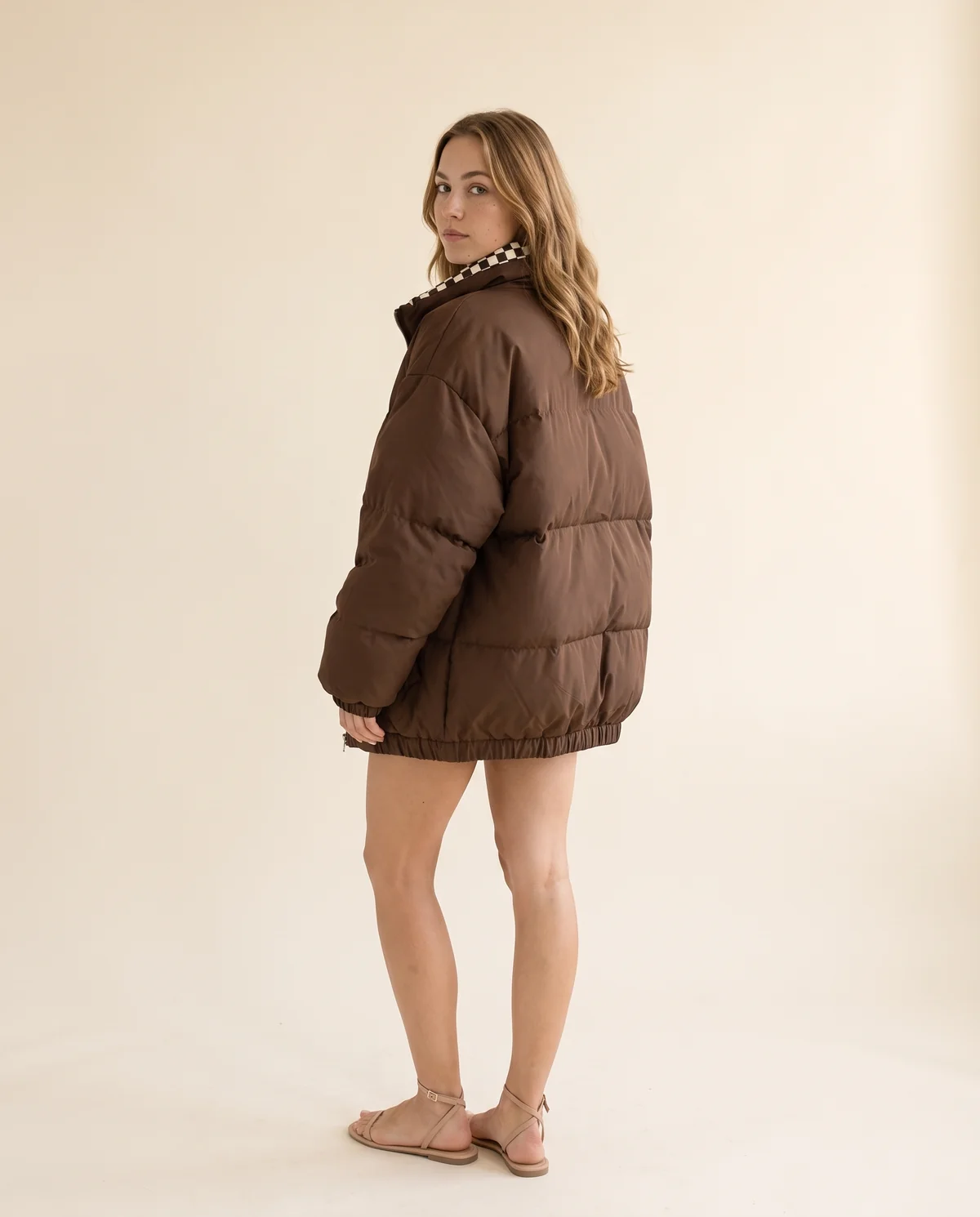 Oversized Puffer Jacket with Check Collar in Chocolate, back view, worn by Ava