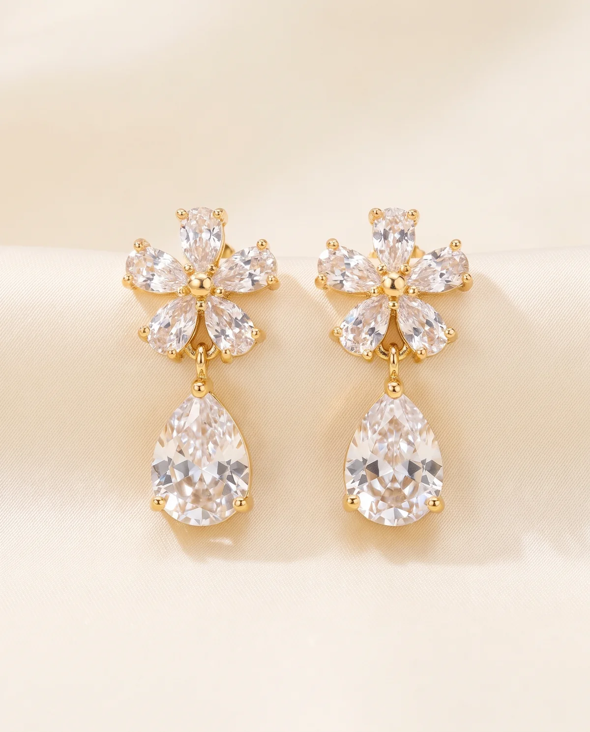 Crystal Flower Drop Earrings in Gold Tone, product shot on a plain background