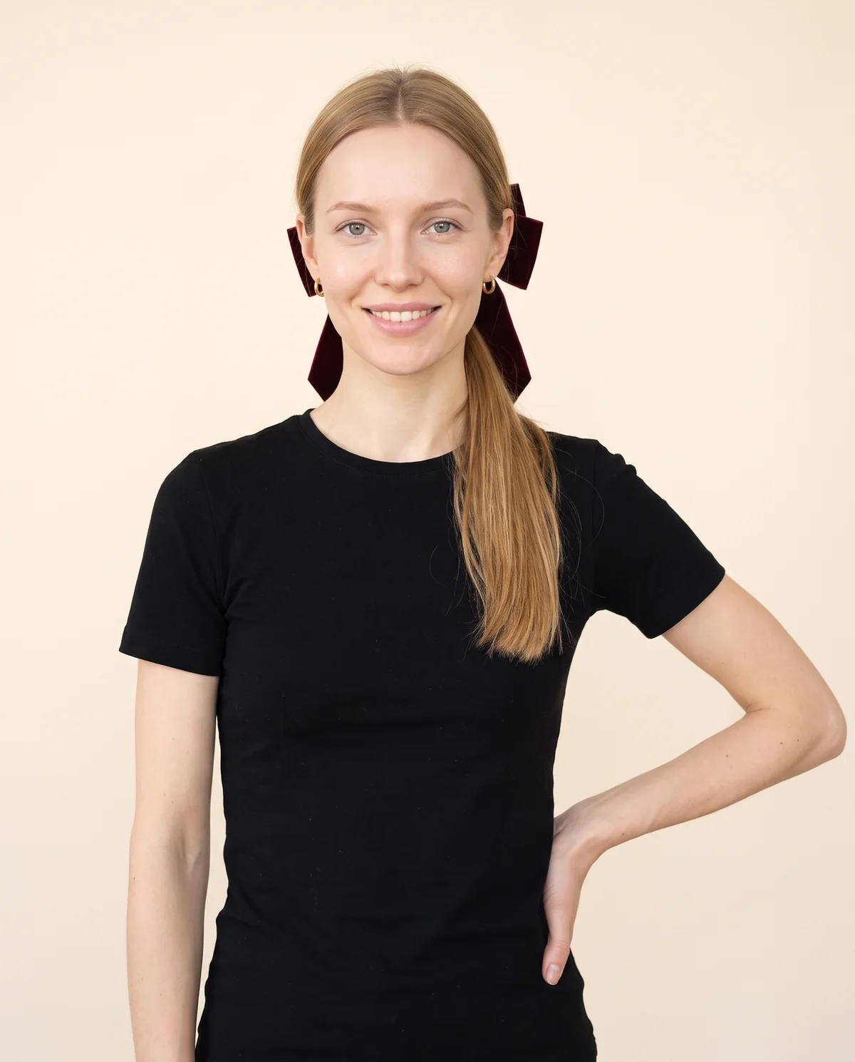 Velvet Bow Hair Barrette in Burgundy, front view, worn by Maya