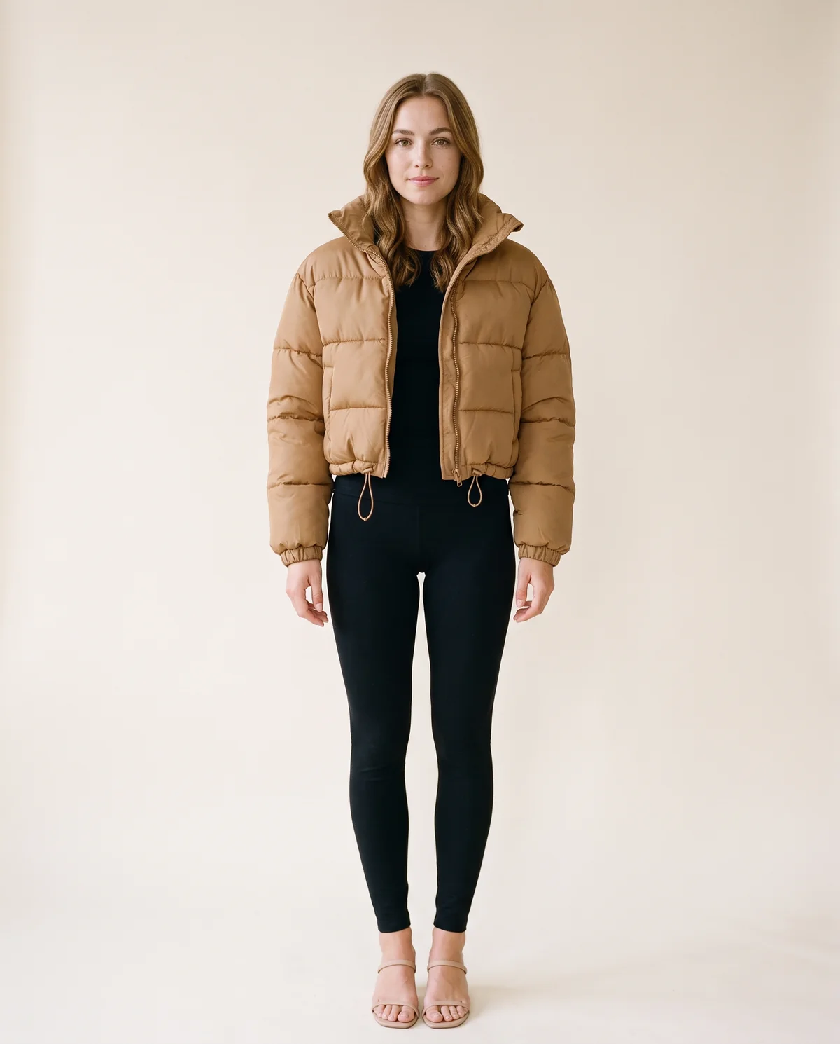Cropped Puffer Jacket with Drawcord Hem in Camel, front view, worn by Ava