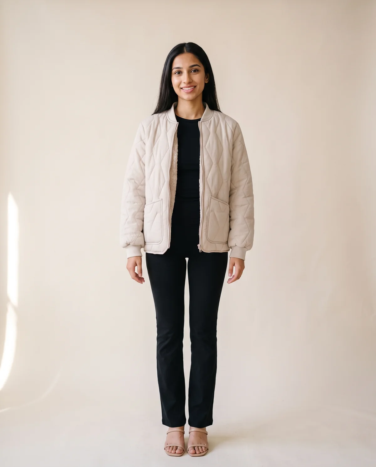 Quilted Bomber Jacket with Soft Fleece Lining in Beige, front view, worn by Priya