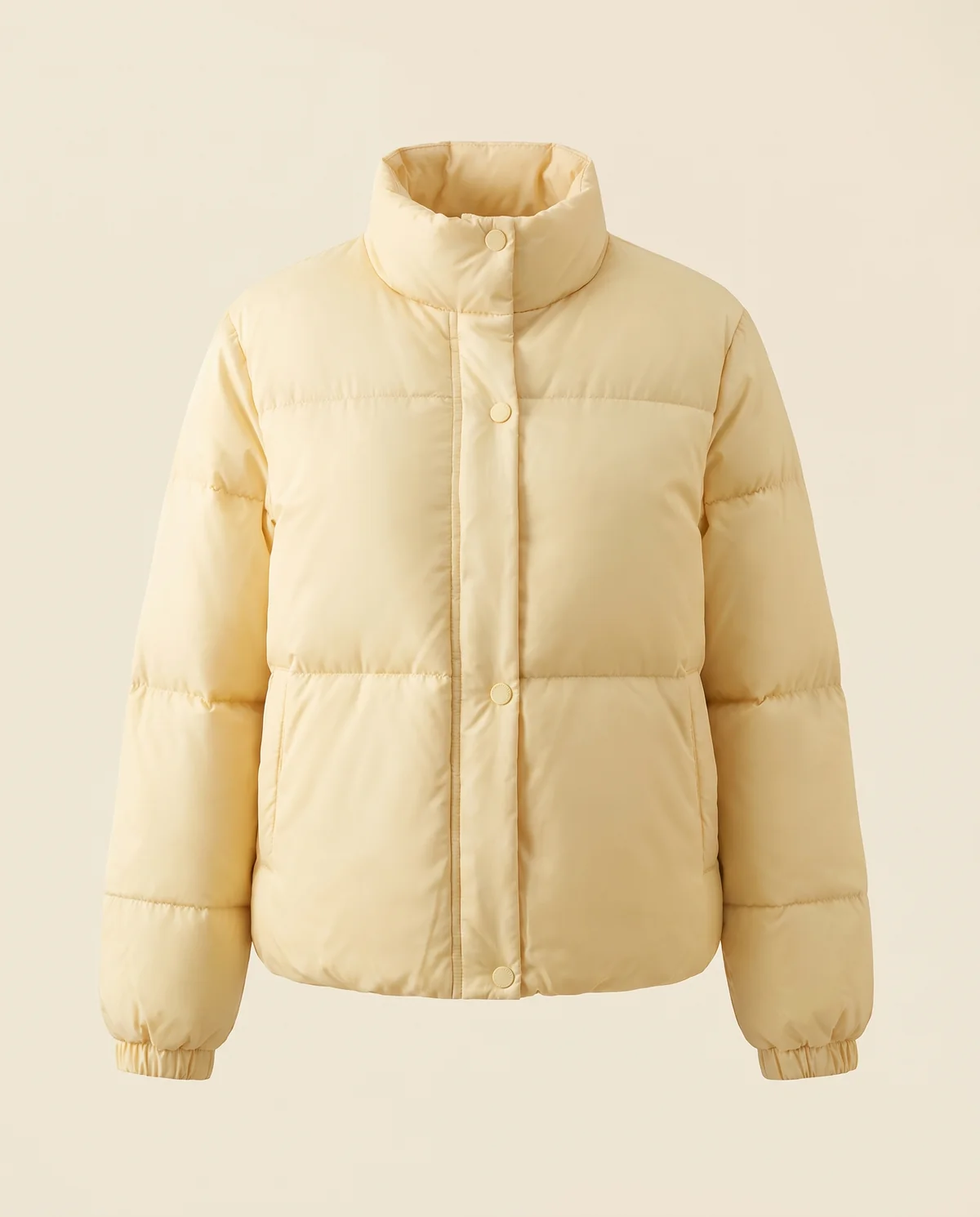 Short Stand-Collar Puffer with Snap Front in Yellow, product shot on a plain background