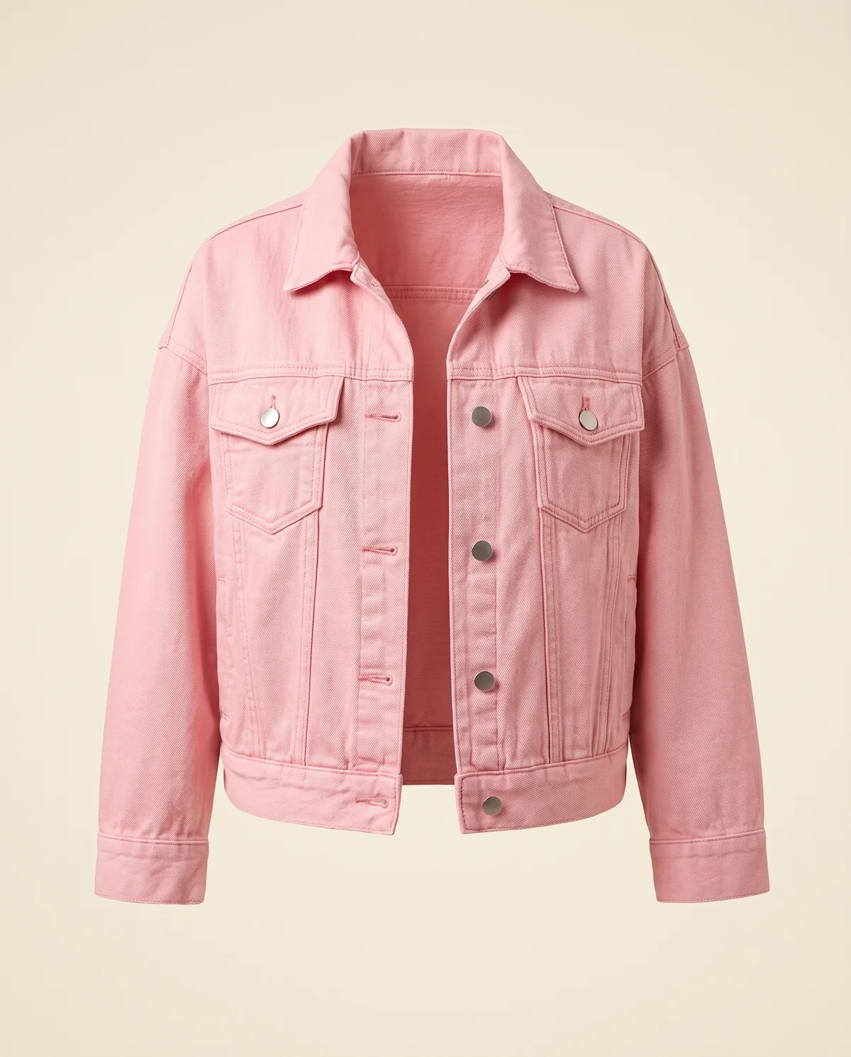 Cropped Denim Trucker Jacket in Pink, product shot on a plain background