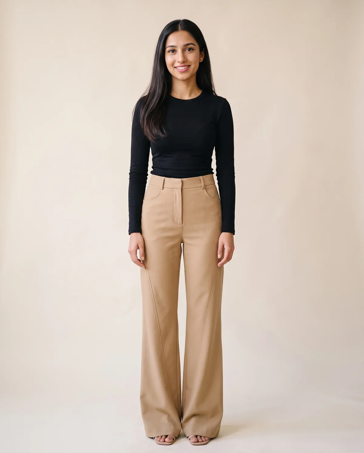 High-Waist Flared Tailored Trousers in Camel, front view, worn by Priya
