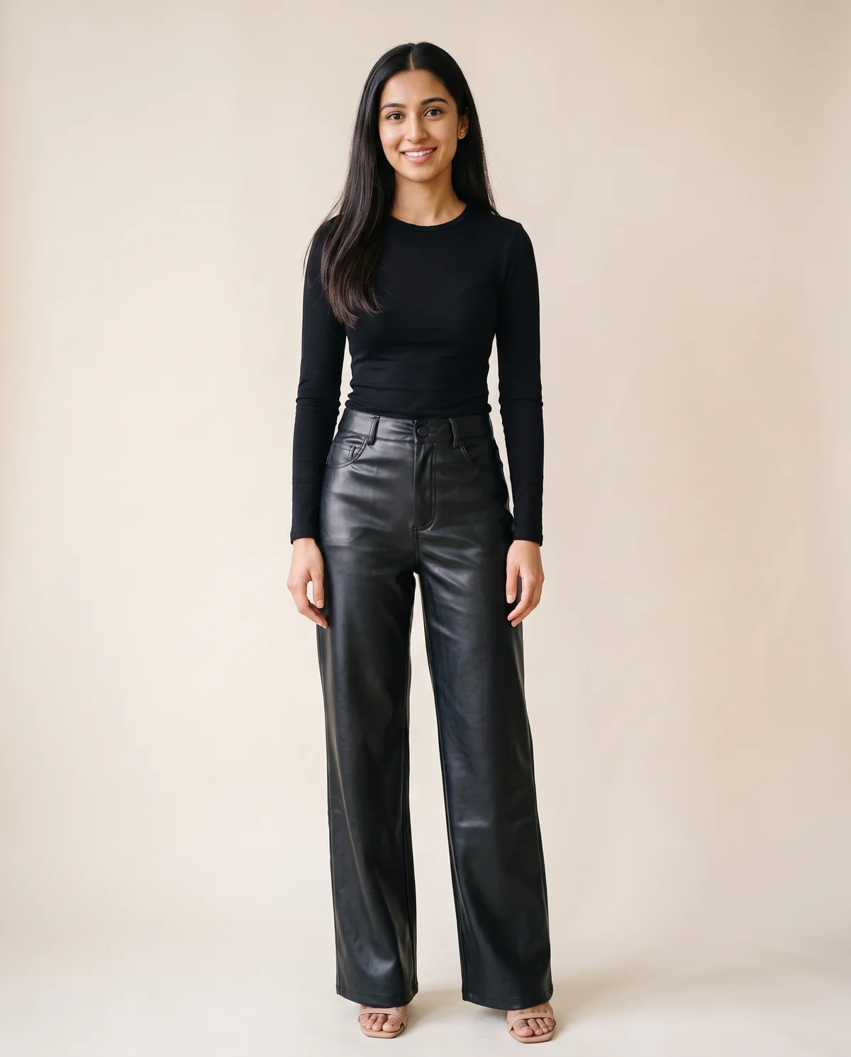 Faux Leather Wide-Leg Trousers in Black, front view, worn by Priya