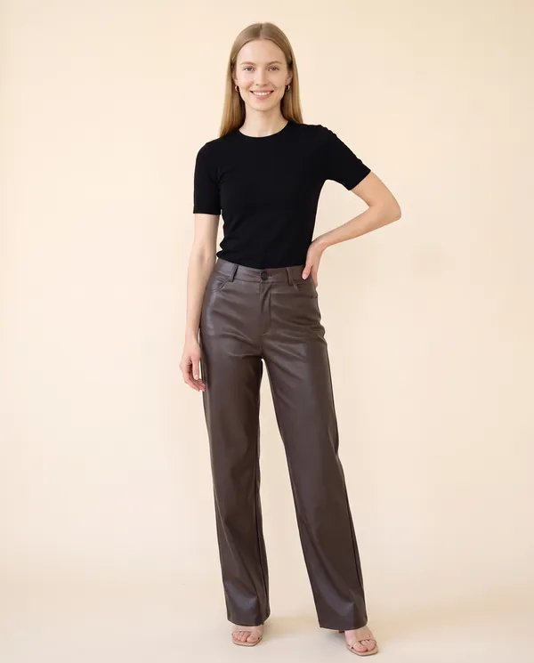 Faux Leather Wide-Leg Trousers in Chocolate, front view, worn by Maya