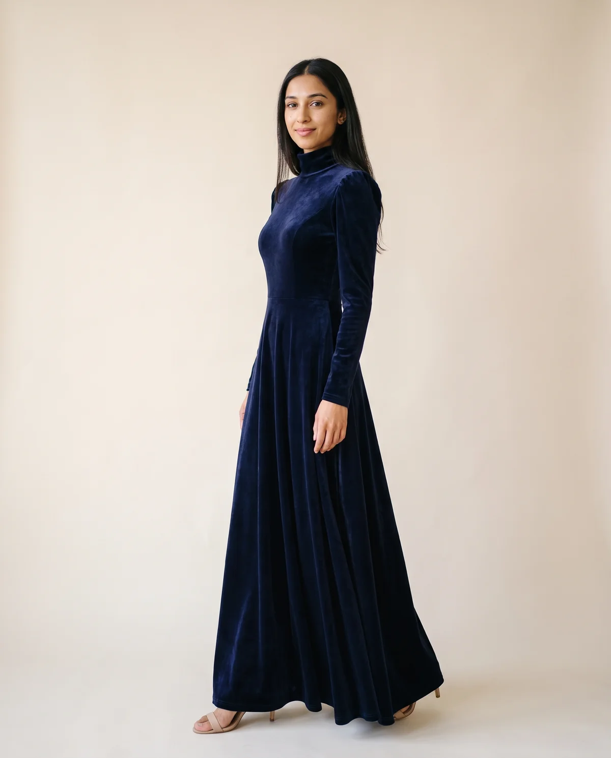 Velvet High-Neck Long-Sleeve Maxi Dress in Navy, side view, worn by Priya