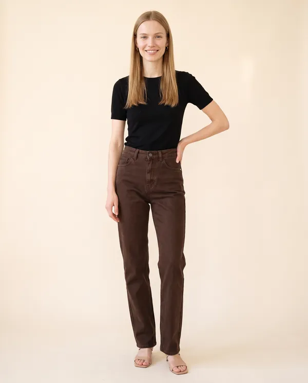 High-Rise Straight-Leg Jeans in Chocolate, front view, worn by Maya