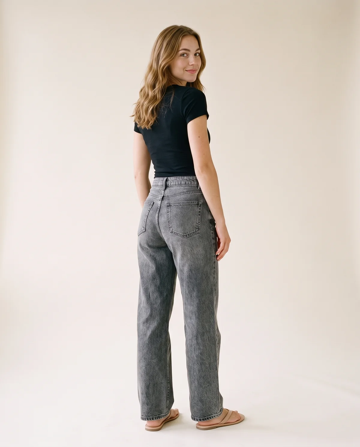 Washed Wide-Leg Jeans in Washed Grey, back view, worn by Ava