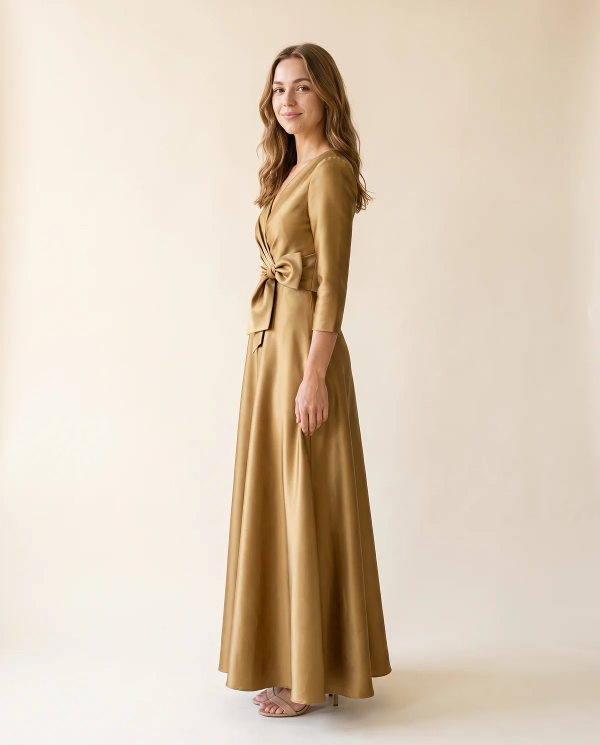 Satin Bow-Waist A-Line Maxi Dress in Antique Gold, side view, worn by Ava