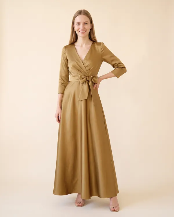 Satin Bow-Waist A-Line Maxi Dress in Antique Gold, front view, worn by Maya
